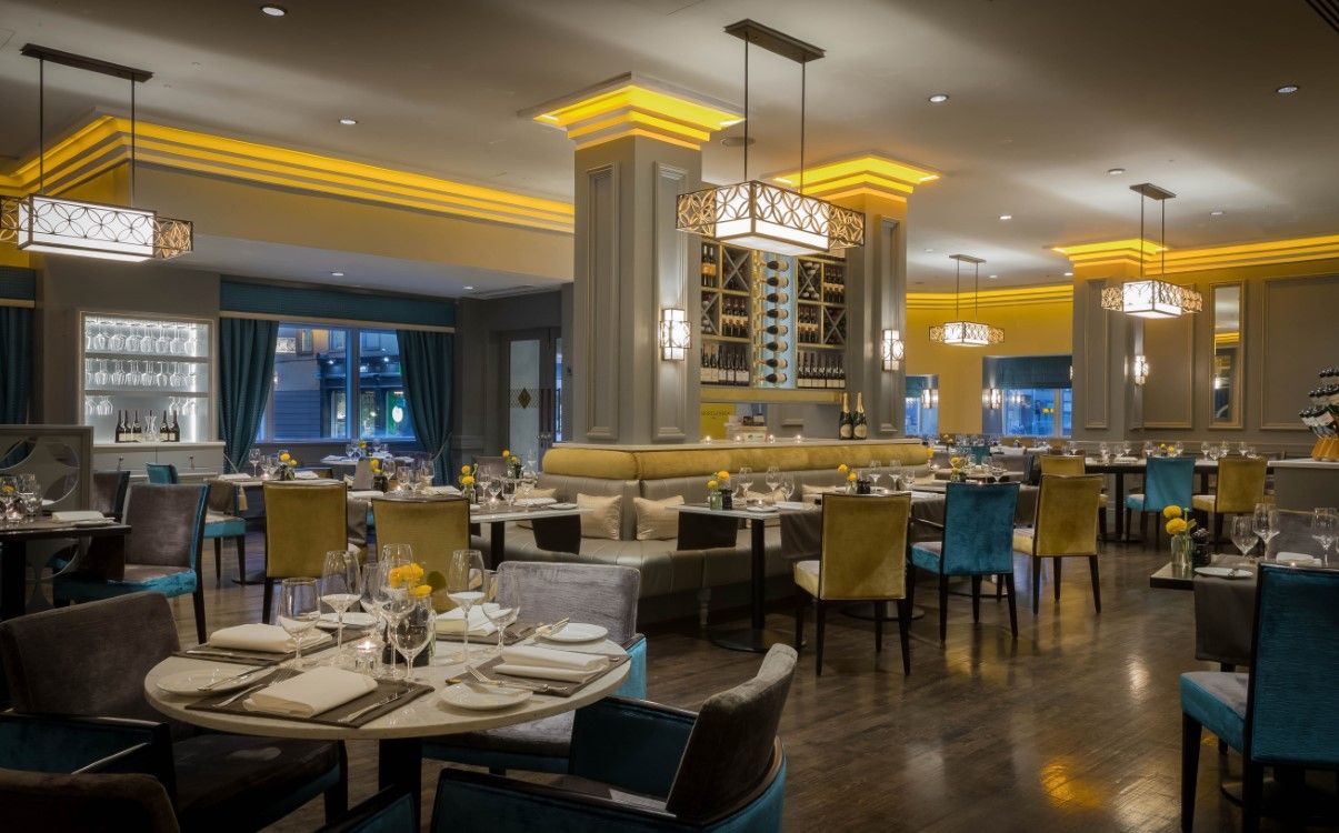 Ambience lighting in restaurant set for dinner in Morelands Grill