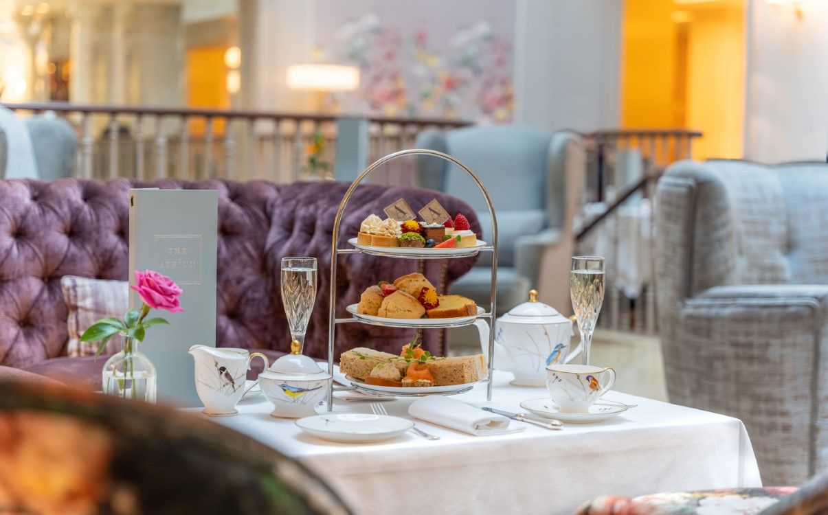 Table set for Afternoon Tea with Champagne glasses in The Atrium Lounge