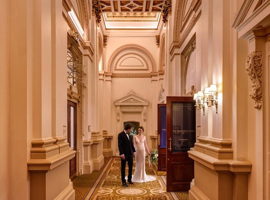 Wedding Couple in The Banking Hall Corridor